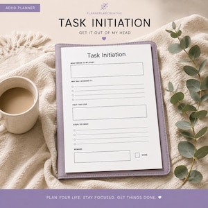 May include: A task initiation planner sheet inside a lavender binder. The page features sections titled Task Initiation, What Needs To Be Done, Why Am I Avoiding It, First Tiny Step, Steps To Finish, and Reward with a checkbox labeled Done.