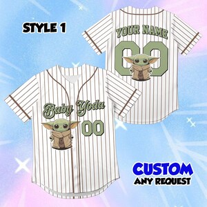 May include: White baseball jersey with brown pinstripes and accents. Features a Baby Yoda graphic, the text "Baby Yoda 00" on the front, and "YOUR NAME 00" on the back. The text "CUSTOM ANY REQUEST" is also visible.