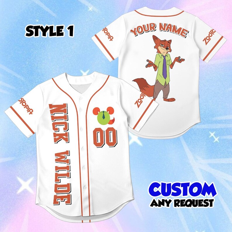 May include: A white baseball jersey with orange trim featuring the text NICK WILDE and the number 00 on the front. The back displays a cartoon fox character, the text YOUR NAME, and the word Zootopia on the sleeves. Text reads STYLE 1.