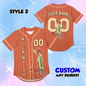 May include: Orange baseball jersey with white pinstripes, featuring a cartoon fox character and the name "NICK WILDE" vertically on the front. The back has "YOUR NAME" and the number "00". The jersey also has the text "CUSTOM ANY REQUEST".