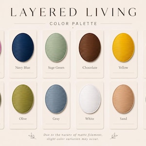 May include: A color palette titled "LAYERED LIVING" displays 12 oval swatches in various colors, including pink, navy blue, sage green, chocolate, yellow, light beige, khaki, olive, gray, white, sand, and black. Text at the bottom notes slight color variation.