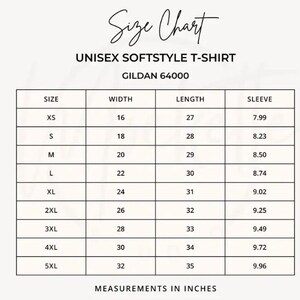 May include: A size chart for a Unisex Softstyle T-Shirt, Gildan 64000. The chart displays sizes XS to 5XL, with corresponding measurements in inches for width, length, and sleeve length. The text "Size Chart" is at the top.