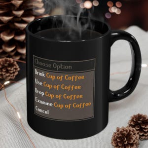May include: Black coffee mug featuring the text "Choose Option" and options to "Drink Cup of Coffee", "Use Cup of Coffee", "Drop Cup of Coffee", and "Examine Cup of Coffee". The mug has a black handle and contains steaming coffee.