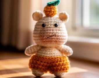 Handmade Crochet Amigurumi Doll with Orange Hat – Soft Stuffed Animal Nursery Decor