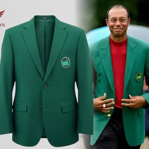 May include: A dark green blazer with a single-button fastening and a small emblem on the chest. The blazer features two front pockets and a traditional lapel. The garment is a solid colour and appears to be made of a smooth material.