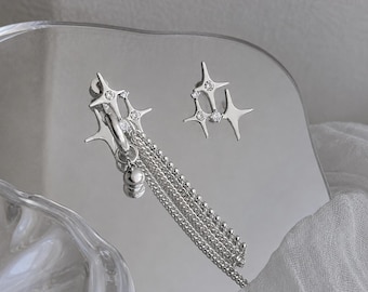 Pendientes Y2K Starburst, pendientes colgantes asimétricos con borlas en forma de estrella, pendientes plateados con brillo celestial, regalo para ella con colgantes de estrella de circonita cúbica desiguales.