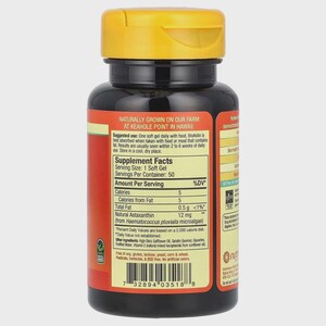 May include: A black supplement bottle with a yellow cap. The label includes text about the product's ingredients and usage, including "Natural Astaxanthin" and "Keahole Point in Hawaii". The bottle contains 50 soft gels.