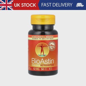 May include: A black bottle of BioAstin Hawaiian Astaxanthin supplements with a yellow cap. The label is orange and features text including "Nature's Powerful Antioxidant" and "12 MG 50 Soft Gels". A graphic of a person is also on the label.