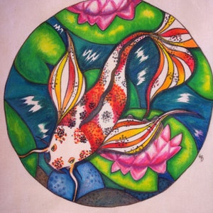 May include: A white tote bag with a colorful hand-painted design of a koi fish swimming in a pond with lily pads. The fish is red, orange, yellow, and black with white spots. The lily pads are pink and green.