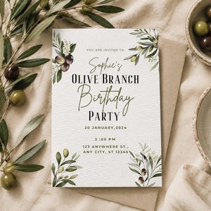 Könnte beinhalten: Eine rechteckige Geburtstagseinladungskarte mit Aquarell-Illustrationen von Olivenzweigen in Grün und Dunkellila. Der Text lautet: You are invited to Sophie's Olive Branch Birthday Party, 20 January, 2024, 2:00 PM, 123 Anywhere St., Any City, ST 12345.