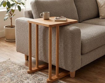 Wooden side table, coffee table that fits under the armchair.