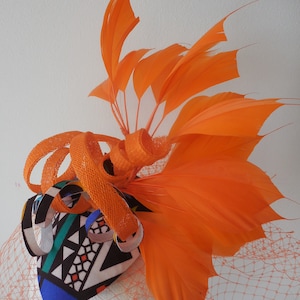 Orange African print fascinator