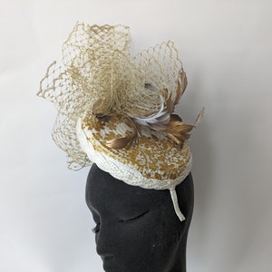 Beige/ivory and off gold feathers fascinator  Mother of the bride |wedding |Races| Party