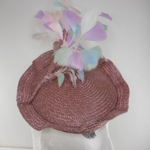 Light pink pillbox with pastel feathers