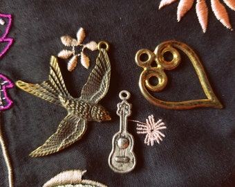 Valentine's Boho Hippie Charms. Brass Silver Boho Charms. Brass Swallow Bird. Bronze Heart. Silver Boho Acoustic Guitar. Set of 3 Charms.