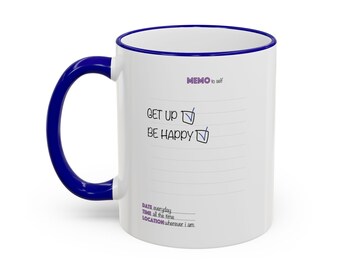 May include: A white ceramic mug with a dark blue handle and rim. The front features the text MEMO to self, followed by a checklist with the items GET UP and BE HAPPY, both checked. Below are the lines for DATE everyday, TIME all the time, and LOCATION wherever i am.