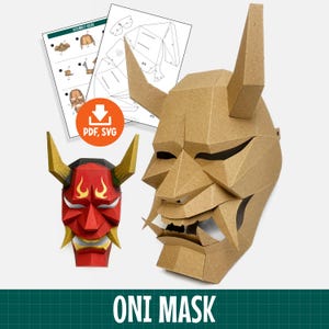 Peut inclure: Un kit de masque Oni en papier comprenant un grand masque couleur carton beige, un plus petit masque rouge avec des cornes dorées et des feuilles de guide d'assemblage. Une icône orange avec une flèche blanche et le texte PDF, SVG est visible.