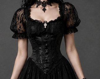 May include: A black dress featuring short puff sleeves made of sheer lace, a square neckline with lace trim, and a central bodice panel with vertical lace detailing. The dress includes a full skirt with lace overlays and a matching lace choker.