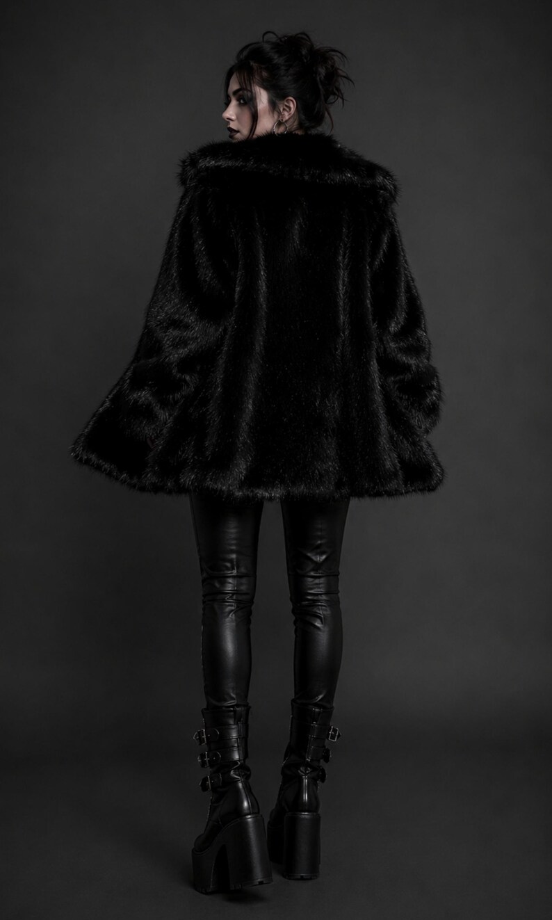 May include: A black faux fur coat with a wide collar, paired with black leather-look trousers and black platform boots featuring multiple buckle straps. The ensemble is entirely black, showcasing a textured coat and smooth, fitted pants.