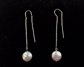 Hanging aRound (pièce de monnaie sur les enfileurs)