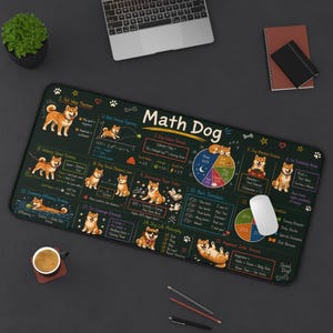 May include: A rectangular black desk mat featuring a Shiba Inu dog theme with the text "Math Dog." The mat includes mathematical formulas and diagrams, a pie chart, and paw prints. A computer mouse is on the mat.