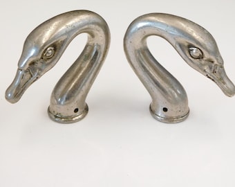 Two antique metal swan heads, handles?