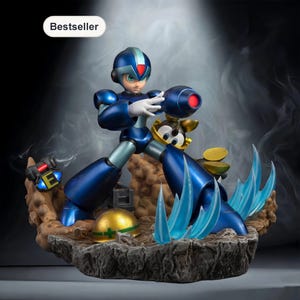 May include: A blue and silver action figure of a character from the Mega Man X video game series. The figure is posed with a weapon, standing on a rocky base with blue water effects. A small yellow character is also present. The word "Bestseller" is in the top left corner.