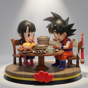 May include: A detailed figurine set featuring two anime-style characters sitting at a round wooden table. One character wears an orange martial arts uniform, the other a dark outfit. The table is filled with plates of food, bowls, and a mug.