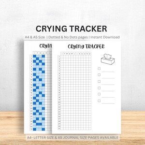 May include: Two-page spread of a "CRYING TRACKER" printable. The left page has a grid with blue squares, and the right page has a blank grid with a tissue box illustration. Text includes "A4 & A5 Size" and "Instant Download."