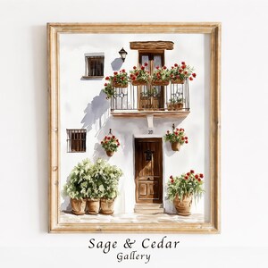 Könnte beinhalten: Ein gerahmtes Aquarellbild einer weißen Gebäudefassade mit einer Holztür, einem Balkon mit roten Blumen und Topfpflanzen. Das Kunstwerk zeigt eine dunkelbraune Tür mit der Nummer 281, eiserne Fenstergitter und üppiges grünes Blattwerk.