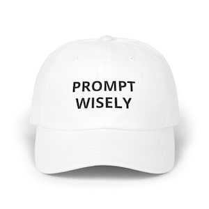 May include: White baseball cap featuring the text "PROMPT WISELY" in black. The cap has a curved peak and a rounded crown. The hat is made of a soft material.