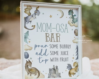 May include: A white sign with a blue and gold dragon design. The sign says "MOM-OSA BAR" and includes instructions for making a drink: "pour some bubbly, add some juice, top with fruit".