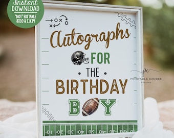 May include: A white sign with green and brown text that says "Autographs for the Birthday Boy". The sign has a football helmet and football graphic. The sign is framed in a white frame.