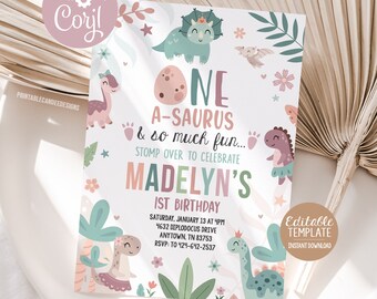 May include: A printable invitation for a first birthday party with a dinosaur theme. The invitation features a pink, green, and blue color scheme with illustrations of dinosaurs and the text "One A-saurus & so much fun... Stomp over to celebrate Madelyn's 1st Birthday".