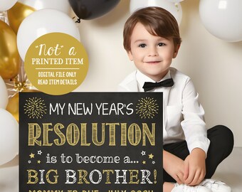 May include: A black chalkboard sign with gold lettering announcing a new baby. The sign reads "My New Year's Resolution is to become a... Big Brother! Mommy is due: July 2024". A young boy in a white shirt and black bow tie holds the sign.