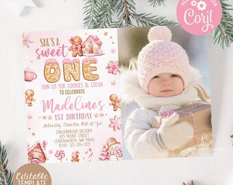 May include: Pink and gold gingerbread-themed first birthday party invitation with a photo of a baby girl in a pink hat. The invitation says "She's a Sweet One" and includes the baby's name, date, time, and location.