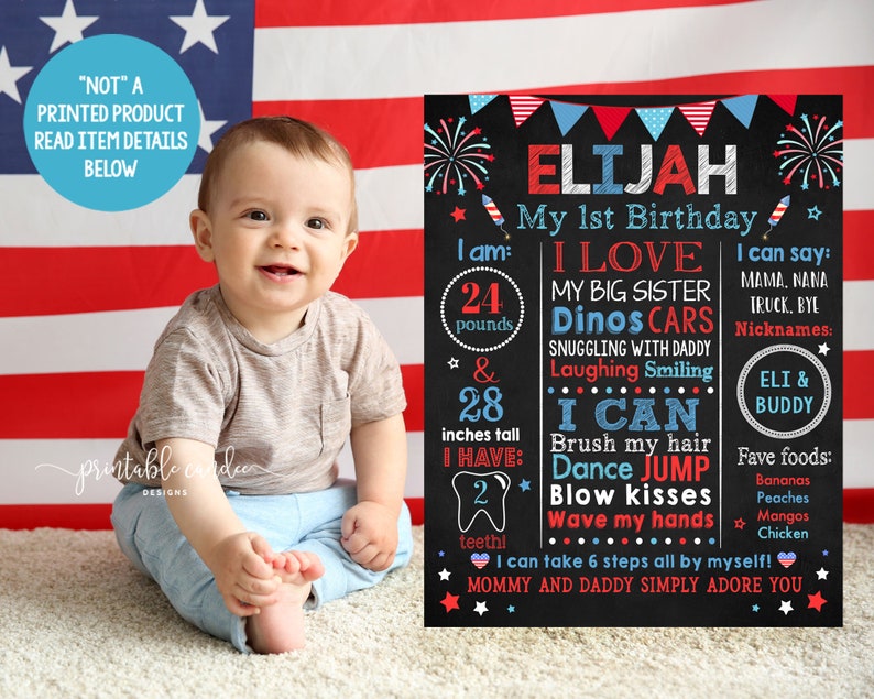 May include: A red, white and blue chalkboard style birthday sign for a boy named Elijah. The sign says "My 1st Birthday" and includes details about the child, such as his weight, height, and favourite things. The sign is decorated with stars and fireworks.