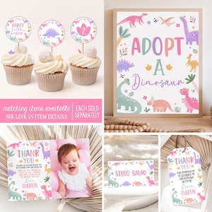 May include: A set of printable dinosaur-themed party decorations for a second birthday. The set includes a sign that says "Adopt a Dinosaur", cupcake toppers, thank you tags, and a photo card. The decorations are pink, green, and purple with a dinosaur illustration.