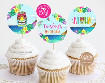 Könnte beinhalten: Drei Cupcake-Topper mit tropischem Thema. Die Topper zeigen eine Tiki-Maske, das Wort "Aloha" und ein Blumenmuster mit dem Text "Paisley's 3rd Birthday".