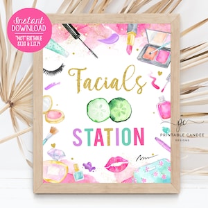May include: A printable sign with a pink background and gold glitter text that says "Facials Station". The sign is decorated with images of makeup, cucumbers, and lips.