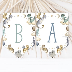 May include: A printable banner with a white background and a blue and gold dragon design. The banner has the letters "B" and "A" in blue on it.