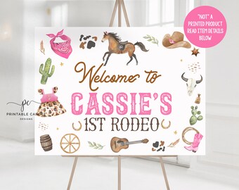 May include: A pink and brown welcome sign for a first rodeo party. The sign says "Welcome to Cassie's 1st Rodeo". The sign is decorated with a variety of western-themed images, including a cactus, a horseshoe, a cowboy hat, a guitar, and a skull.