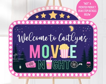 May include: A pink and blue movie night sign with the text "Welcome to Caitlyn's Movie Night" and a star-shaped marquee. The sign is decorated with popcorn, a drink, a movie ticket, and a film reel.