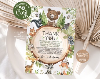 May include: A woodland-themed thank you card featuring a brown tree trunk and various woodland animals, including a bear, raccoon, fox, deer, owl, and squirrel. The text reads "Thank You" with paw prints and "Thank you for coming to my baby shower and helping celebrate the upcoming arrival of our baby boy. Thank you for your wonderful gift. Your kindness and generosity are greatly appreciated. We look forward to introducing you to our newest addition very soon. [Name] and [Name]" and "Editable Template Add photo or leave blank".