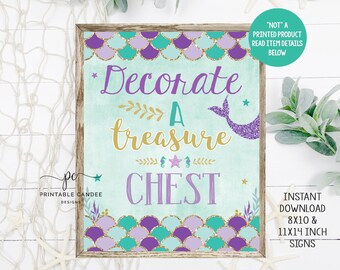 May include: Printable sign with a mermaid tail and seashells, reading "Decorate a treasure chest". The sign is on a light blue background with gold glitter accents. It is available in 8x10 and 11x14 inch sizes.