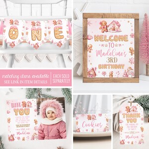 May include: Gingerbread house themed printable party decorations. Includes a welcome sign, thank you tags, a banner, and a photo card. The decorations are pink and gold with gingerbread house and gingerbread man illustrations.