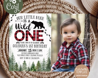 May include: A printable invitation for a first birthday party with a woodland theme. The invitation features a red and black buffalo plaid pattern, a cartoon bear, and the text "Our Little Bear is a Wild One".