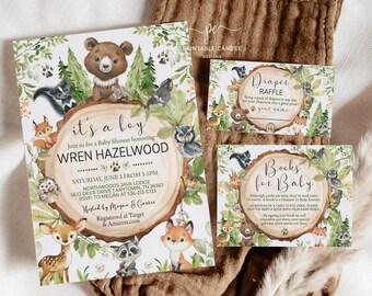 May include: It's a boy baby shower invitation with a woodland theme. The invitation features a brown bear, a fox, a raccoon, a deer, and an owl. The text on the invitation reads "It's a boy" and "Join us for a Baby Shower honoring Wren Hazelwood".
