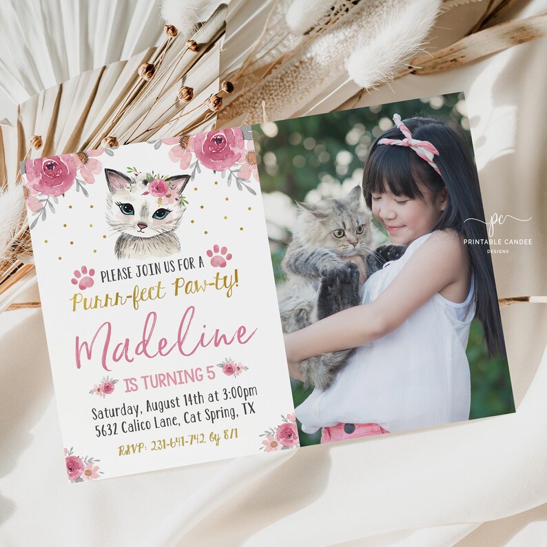 May include: A pink and gold birthday invitation featuring a cute cartoon cat wearing a flower crown. The invitation reads "Please join us for a Purrr-fect Paw-ty! Madeline is turning 5" and includes the date, time, and location of the party.
