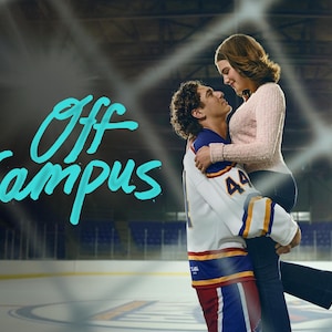 May include: A couple embraces on an ice rink. The man wears a white hockey jersey with blue and gold accents and the number 44. The woman wears a pink sweater and dark pants. The words "Off Campus" are written in teal.